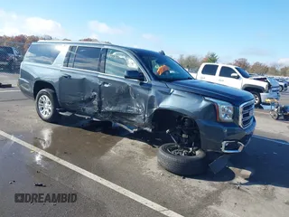 2019 GMC Yukon XL SLT with VIN 1GKS2GKC9KR369946, listed as a IAAI auction lot 40781051 with 141,791 mi miles and . Bid and sale history available at carsss.com. Image 1.