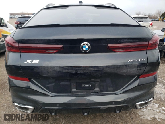 2025 BMW X6 xDrive40i with VIN 5UX33EX09S9X97725, listed as a Copart auction lot 41821165 with 0 mi miles and Salvage Title. Bid and sale history available at carsss.com. Image 6.