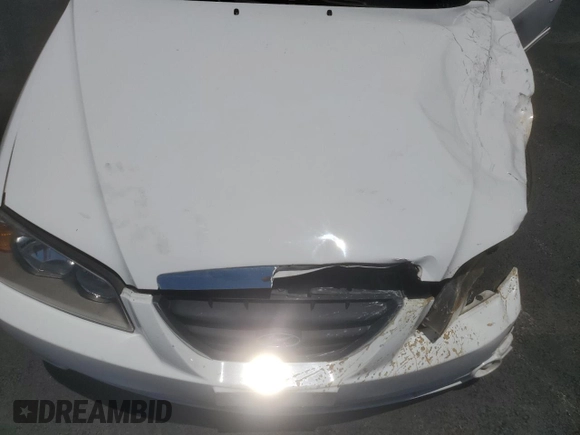 2006 Hyundai Elantra GLS with VIN KMHDN46D96U288604, listed as a Copart auction lot 58603915 with 92,518 mi miles and Salvage title. Bid and sale history available at DreamBid. Image 11.