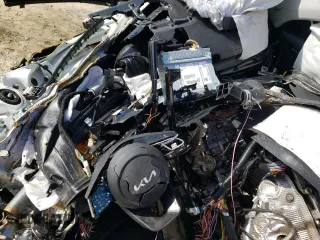 2022 Kia Seltos EX z VIN KNDERCAA0N7313584, wystawiony jako Copart lot #70715003 z przebiegiem Nie podano mil oraz Szkoda całkowita • Salvage title. Historia ofert i sprzedaży dostępna na DreamBid. Obrazek 9.