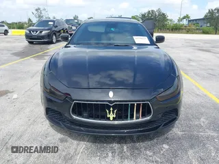 2015 Maserati Ghibli with VIN ZAM57XSA1F1144073, listed as a IAAI auction lot 42770723 with 105,782 mi miles and . Bid and sale history available at DreamBid. Image 12.