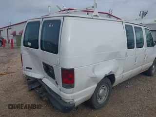 2004 Ford Econoline Cargo with VIN 1FTRE14WX4HA06537, listed as a IAAI auction lot 41745018 with 246,963 mi miles. Bid and sale history available at carsss.com. Image 14.