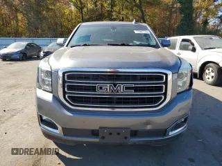 2019 GMC Yukon SLE with VIN 1GKS2AKC4KR334387, listed as a Copart auction lot 77267774 with 62,821 mi miles and Salvage Title. Bid and sale history available at carsss.com. Image 5.