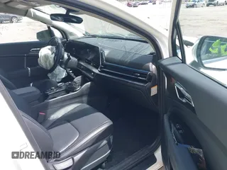 2023 Kia Sportage EX z VIN KNDPVCAG9P7095057, wystawiony jako IAAI lot #42016214 z przebiegiem 8 789 mil mil oraz . Historia ofert i sprzedaży dostępna na DreamBid. Obrazek 5.