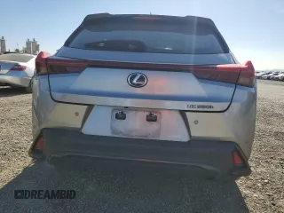 2022 Lexus UX 250h F Sport with VIN JTHE9JBHXN2057367, listed as a Copart auction lot 85917724 with 60,556 mi miles and Salvage Title. Bid and sale history available at DreamBid. Image 6.