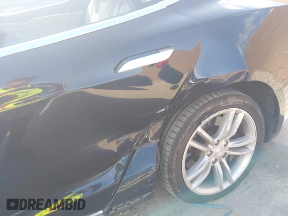 2013 Tesla Model S with VIN 5YJSA1CN8DFP07177, listed as a IAAI auction lot 42127797 with 75,227 mi miles and . Bid and sale history available at DreamBid. Image 6.
