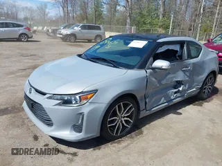 2014 Scion tC with VIN JTKJF5C70E3083839, listed as a IAAI auction lot 41886711 with 118,029 mi miles. Bid and sale history available at carsss.com. Image 17.