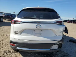2019 Mazda CX-9 Grand Touring with VIN JM3TCADY0K0326045, listed as a Copart auction lot 83838054 with 125,308 mi miles and Salvage Title. Bid and sale history available at carsss.com. Image 6.