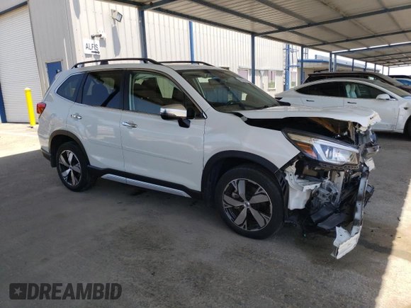 2019 Subaru Forester Touring with VIN JF2SKAWCXKH487319, listed as a Copart auction lot 60920845 with 36,263 mi miles and Salvage title. Bid and sale history available at DreamBid. Image 4.