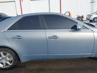 2008 Cadillac CTS RWD w/1SA with VIN 1G6DF577880144992, listed as a IAAI auction lot 41437908 with 158,723 mi miles. Bid and sale history available at carsss.com. Image 14.