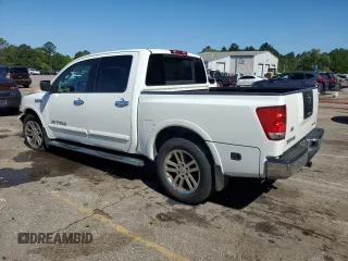 2012 Nissan Titan SV with VIN 1N6BA0ED9CN302103, listed as a Copart auction lot 52678495 with 214,564 mi miles and Salvage title. Bid and sale history available at DreamBid. Image 2.