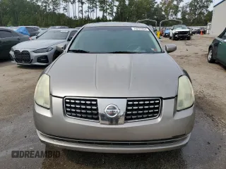 2004 Nissan Maxima SE with VIN 1N4BA41E34C888731, listed as a Copart auction lot 74233304 with 197,764 mi miles and Salvage Title. Bid and sale history available at carsss.com. Image 5.