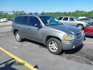 2007 GMC Envoy SLE with VIN 1GKDS13S672158084, listed as a IAAI auction lot 41989637 with 188,512 mi miles. Bid and sale history available at carsss.com. Image 1.