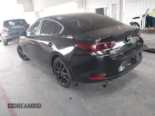 2024 Mazda 3 S Select Sport with VIN 3MZBPABM1RM408945, listed as a IAAI auction lot 42398805 with 42,283 mi miles and . Bid and sale history available at DreamBid. Image 3.