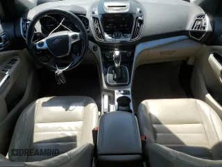 2013 Ford Escape SEL z VIN 1FMCU9H93DUD67848, wystawiony jako Copart lot #57221755 z przebiegiem 129 671 mil mil oraz Czysty tytuł • Clean title. Historia ofert i sprzedaży dostępna na DreamBid. Obrazek 8.