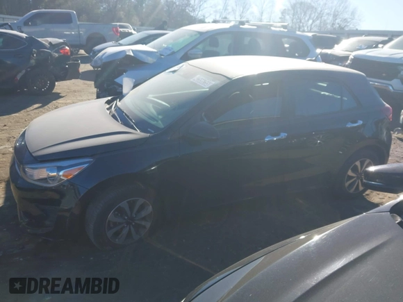 2022 Kia Rio S with VIN 3KPA25AD8NE443590, listed as a IAAI auction lot 41684325 with 73,231 mi miles and . Bid and sale history available at DreamBid. Image 14.