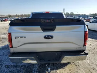 2015 Ford F-150 XLT with VIN 1FTEW1C88FKD74865, listed as a Copart auction lot 48251125 with 215,845 mi miles and Salvage Title. Bid and sale history available at carsss.com. Image 6.