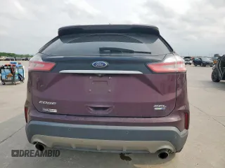 2019 Ford Edge SEL with VIN 2FMPK4J90KBB68182, listed as a Copart auction lot 57158435 with 71,598 mi miles and Salvage title. Bid and sale history available at DreamBid. Image 6.