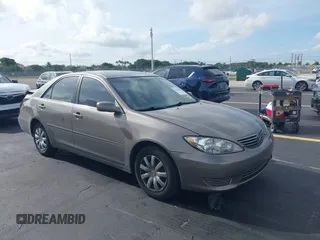 2006 Toyota Camry STD z VIN 4T1BE32K96U719755, wystawiony jako IAAI lot #42484020 z przebiegiem 155 910 mil mil oraz . Historia ofert i sprzedaży dostępna na DreamBid. Obrazek 1.
