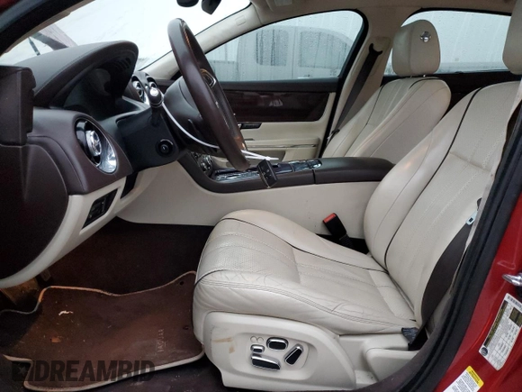 2013 Jaguar XJ Portfolio z VIN SAJWJ2GD0D8V47886, wystawiony jako Copart lot #42612345 z przebiegiem 117 383 mil mil oraz Szkody całkowita. Historia ofert i sprzedaży dostępna na DreamBid. Obrazek 7.