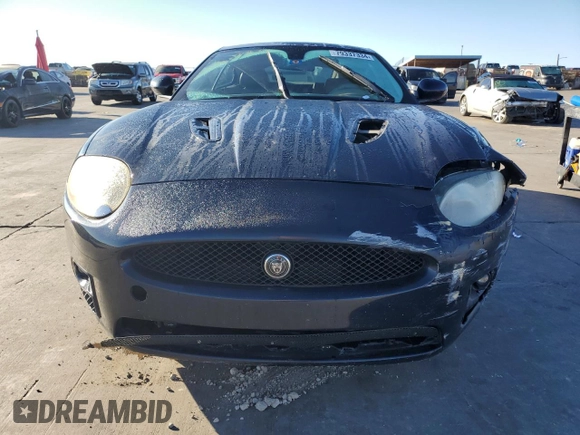 2008 Jaguar XK with VIN SAJWA43C589B23096, listed as a Copart auction lot 79337334 with 143,902 mi miles and Salvage Title. Bid and sale history available at carsss.com. Image 5.
