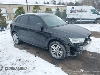 2017 Audi Q3 Premium z VIN WA1BCCFSXHR012345, wystawiony jako IAAI lot #41589844 z przebiegiem 125 044 mil mil oraz . Historia ofert i sprzedaży dostępna na DreamBid. Obrazek 1.