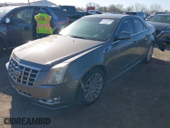 2012 Cadillac CTS Premium with VIN 1G6DS5E3XC0128264, listed as a IAAI auction lot 41964295 with 117,889 mi miles and . Bid and sale history available at DreamBid. Image 17.