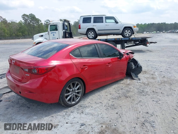 2018 Mazda 3 Touring with VIN 3MZBN1V3XJM183616, listed as a IAAI auction lot 42038219 with 130,268 mi miles and . Bid and sale history available at DreamBid. Image 4.