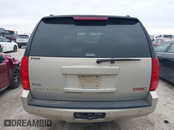 2007 GMC Yukon XL SLT z VIN 1GKFC16097R280171, wystawiony jako IAAI lot #41319694 z przebiegiem 241 553 mil mil oraz . Historia ofert i sprzedaży dostępna na DreamBid. Obrazek 16.