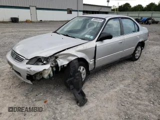 2000 Honda Civic VP with VIN 2HGEJ6611YH525471, listed as a Copart auction lot 69864324 with 115,313 mi miles and Salvage Title. Bid and sale history available at carsss.com. Image 1.
