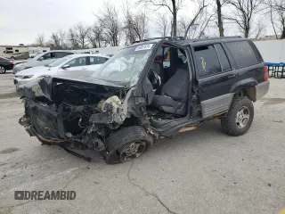 1998 Jeep Grand Cherokee Laredo with VIN 1J4FX58S1WC348125, listed as a Copart auction lot 86061674 with 0 mi miles and Salvage Title. Bid and sale history available at carsss.com. Image 1.