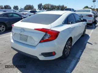 2016 Honda Civic Sedan EX with VIN 2HGFC2F75GH537133, listed as a IAAI auction lot 42081927 with 130,917 mi miles. Bid and sale history available at carsss.com. Image 4.