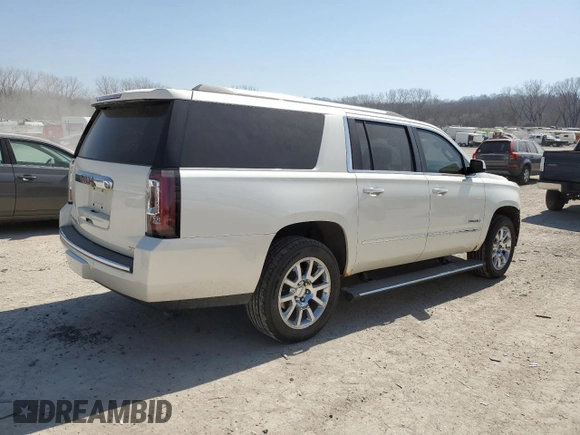 2015 GMC Yukon XL Denali with VIN 1GKS2JKJ3FR585809, listed as a Copart auction lot 48219925 with 191,102 mi miles and Salvage Title. Bid and sale history available at DreamBid. Image 3.
