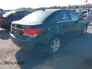 2014 Chevrolet Cruze 1LT with VIN 1G1PC5SB0E7422942, listed as a IAAI auction lot 42107523 with 137,701 mi miles and . Bid and sale history available at DreamBid. Image 4.