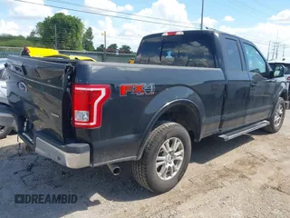 2015 Ford F-150 XLT with VIN 1FTFX1EF2FFA24086, listed as a IAAI auction lot 42555169 with 90,727 mi miles and . Bid and sale history available at DreamBid. Image 4.