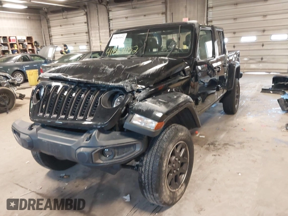 2021 Jeep Gladiator Willys with VIN 1C6HJTAGXML514043, listed as a IAAI auction lot 41869052 with 37,783 mi miles. Bid and sale history available at carsss.com. Image 2.