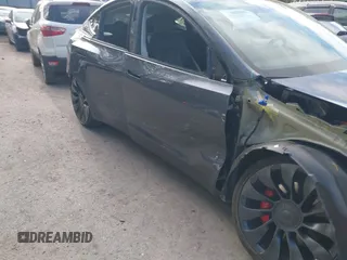 2023 Tesla Model Y Performance z VIN 7SAYGDEFXPF767971, wystawiony jako IAAI lot #42198881 z przebiegiem 32 442 mil mil oraz . Historia ofert i sprzedaży dostępna na DreamBid. Obrazek 20.