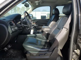2012 Chevrolet Suburban LT with VIN 1GNSKJE74CR216133, listed as a Copart auction lot 47187385 with 199,922 mi miles and Salvage Title. Bid and sale history available at carsss.com. Image 7.
