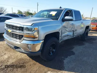 2018 Chevrolet Silverado 1500 LT with VIN 3GCPCREC9JG574686, listed as a IAAI auction lot 41676124 with 74,239 mi miles and . Bid and sale history available at DreamBid. Image 17.