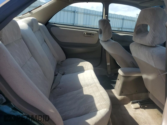 2000 Acura Integra LS z VIN JH4DB765XYS001338, wystawiony jako Copart lot #74884714 z przebiegiem 179 441 mil mil oraz Szkoda całkowita • Salvage title. Historia ofert i sprzedaży dostępna na DreamBid. Obrazek 10.