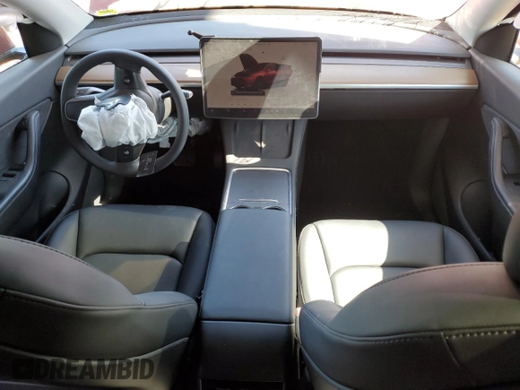 2022 Tesla Model Y Long Range z VIN 7SAYGDEE3NF436119, wystawiony jako Copart lot #54892115 z przebiegiem 27 054 mil mil oraz Szkody całkowita. Historia ofert i sprzedaży dostępna na DreamBid. Obrazek 8.