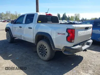 2023 Chevrolet Colorado 4WD Trail Boss with VIN 1GCPTEEK2P1203392, listed as a IAAI auction lot 42043211 with 27,589 mi miles. Bid and sale history available at carsss.com. Image 3.