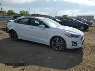 2020 Ford Fusion Titanium with VIN 3FA6P0D96LR173756, listed as a Copart auction lot 56467885 with 77,217 mi miles and Salvage title. Bid and sale history available at DreamBid. Image 4.
