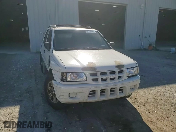 2001 Isuzu Rodeo S with VIN 4S2CK58W514310849, listed as a Copart auction lot 89221945 with 138,720 mi miles and Salvage title. Bid and sale history available at DreamBid. Image 12.