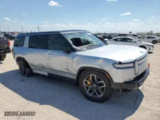 2024 Rivian R1S Adventure with VIN 7PDSGABA5RN033603, listed as a Copart auction lot 74201084 with 0 mi miles and Salvage Title. Bid and sale history available at carsss.com. Image 4.