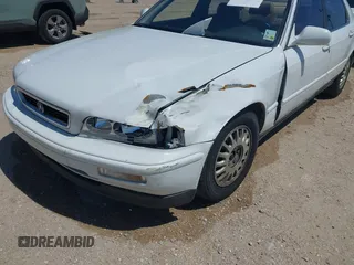 1993 Acura Legend L with VIN JH4KA7668PC025178, listed as a IAAI auction lot 41990390 with 187,755 mi miles and . Bid and sale history available at DreamBid. Image 6.