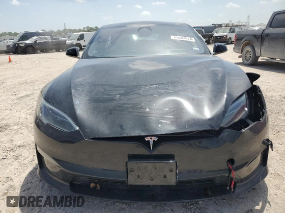 2023 Tesla Model S Plaid with VIN 5YJSA1E62PF511875, listed as a Copart auction lot 65583824 with Not provided miles and Salvage title. Bid and sale history available at DreamBid. Image 5.