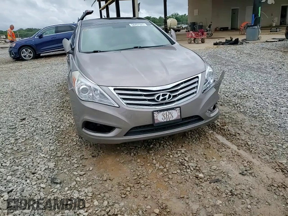 2013 Hyundai Azera z VIN KMHFH4JG4DA262993, wystawiony jako Copart lot #58497925 z przebiegiem 151 568 mil mil oraz Szkoda całkowita • Salvage title. Historia ofert i sprzedaży dostępna na DreamBid. Obrazek 13.