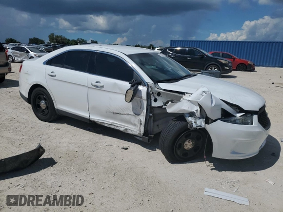 2015 Ford Police Interceptor with VIN 1FAHP2L84FG148962, listed as a Copart auction lot 71539464 with 140,072 mi miles and Salvage title. Bid and sale history available at DreamBid. Image 4.