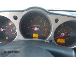 2005 Nissan 350Z Touring z VIN JN1AZ36A25M754869, wystawiony jako IAAI lot #41429477 z przebiegiem 110 896 mil mil oraz . Historia ofert i sprzedaży dostępna na DreamBid. Obrazek 7.